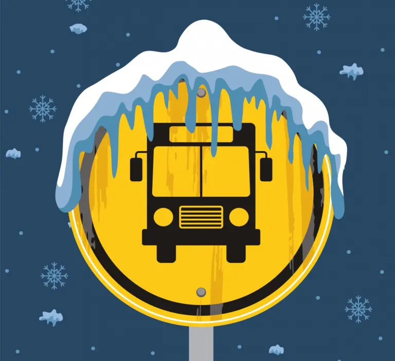 Gul skylt som visar en buss med snö på