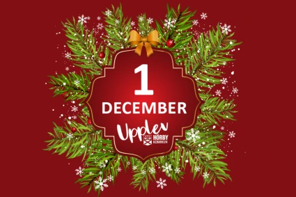 Julglitter med datumet 1 december och texten Upplev Hörby