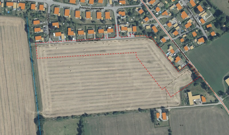 Planområdet (markerat med röd streckad linje) och dess omgivningar.