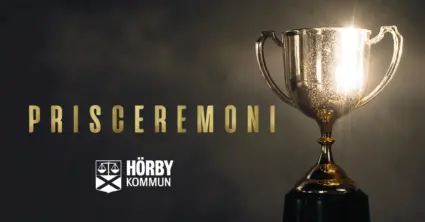 Bild med pokal och text prisceremoni